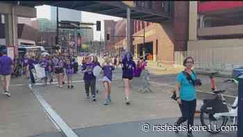 Walk To End Alzheimer's turns Minneapolis streets purple