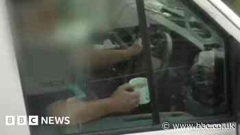 Driver caught drinking mug of tea on motorway