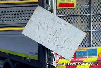 Biggin Hill road workers make signs to stop being targeted as ULEZ