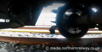 FIRST LOOK: GoPro footage shows water technology fitted underneath Northern passenger train blasting disruptive fallen leaves from the track