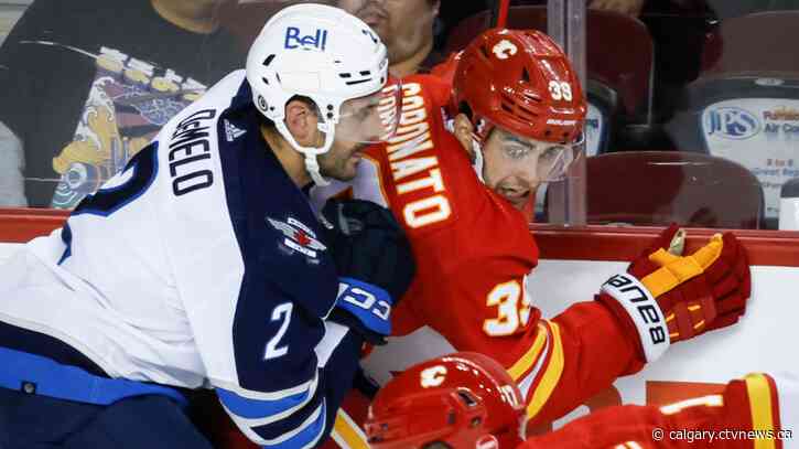 Flames rally from 3-1 deficit to ground Jets 5-4 in pre-season play