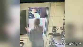 Man arrested after video shows him slapping coffee out of McDonald's manager's hands, causing burns