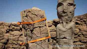 Unusual statue featuring a frontal depiction of a man holding his phallus with both hands is discovered near to Mesolithic temple in Turkey