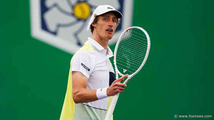 Australian tennis star Marc Polmans disqualified after hitting ball in umpire's face