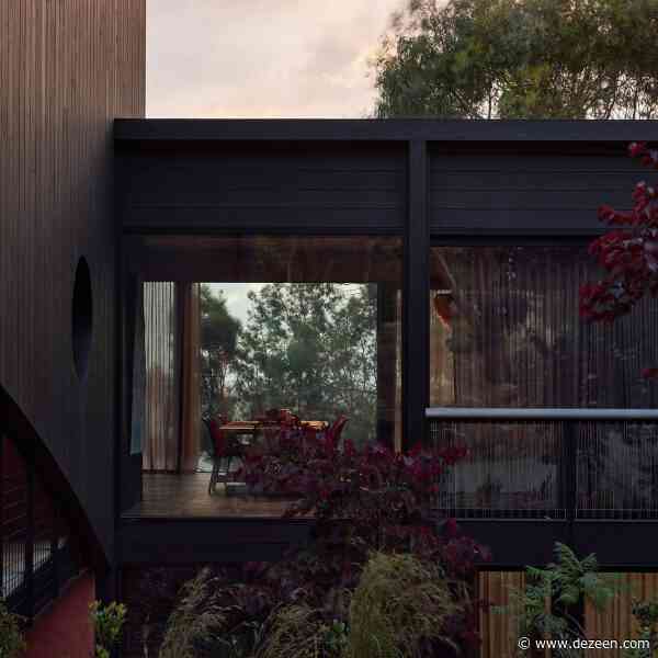 Kennedy Nolan covers L-shaped coastal home in charred timber