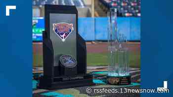 Celebrate and take a picture with Norfolk Tides' championship trophies