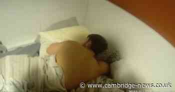Watch as dozy Cambridgeshire drug dealer sleep through police raid