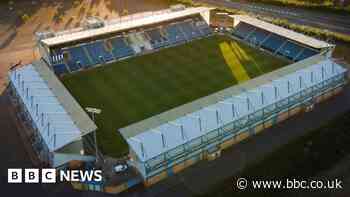Colchester player pushed by away fan after game