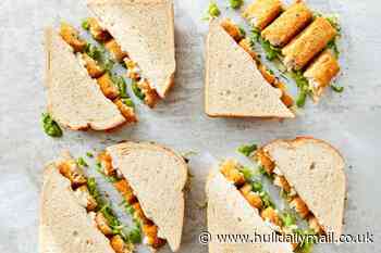 Formula for perfect fish finger sandwich - made on white bread and topped with ketchup