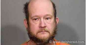 Island Lake man pleads guilty to choking and killing a dog, gets two years probation