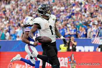 Etienne Runs for 2 TDs and Jaguars Beat Bills 25-20 for Back-To-Back London Wins