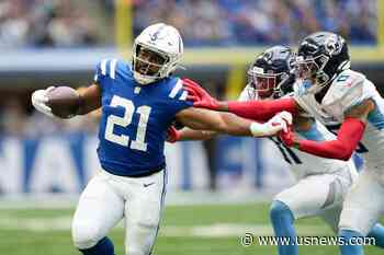 Moss Upstages Taylor's Return in Colts' 23-16 Victory Over Titans. Richardson Injures Shoulder