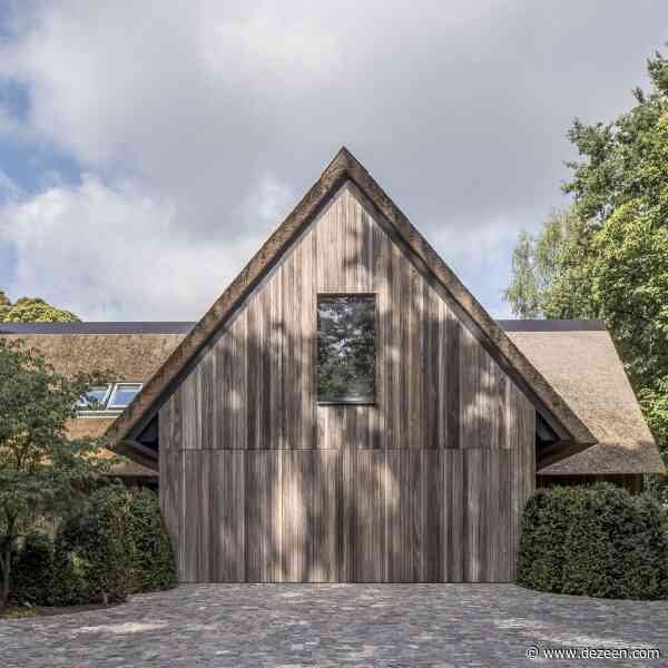 Britsom Philips reconfigures Belgian home with minimalist interiors and thatched roof