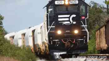 All aboard! Train tugs Artemis 2 moon rocket parts to the NASA launch center (photos, video)