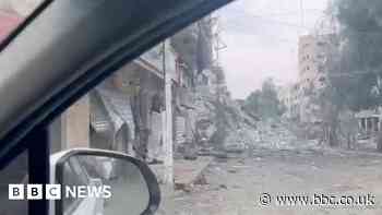 Driving through Gaza streets hit by Israel strikes