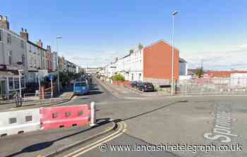 Man found in street with slash wounds to head and neck