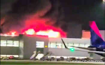London Luton Airport closed and flights suspended as fire rips through car park