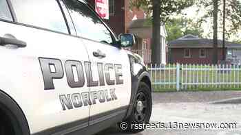 Woman arrested for trying to hit Norfolk officer with car, police say