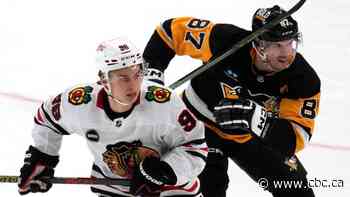 Bedard bests Crosby, picks up assist in 1st NHL game as Chicago earns comeback win