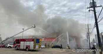 Firefighters battle blaze at unoccupied building in central Edmonton on Wednesday