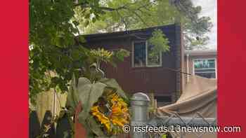 1 injured, 8 people displaced in Norfolk townhome fire caused by unattended candle