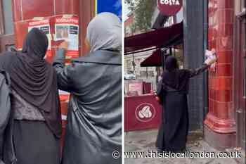 Two women 'tear down Israeli posters' in Camden Town