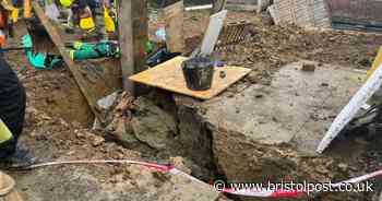Builder trapped in hole for six hours before being rescued by firefighters