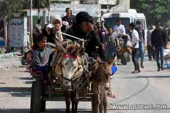 Weary Families Trudge Through Gaza Streets, Trying to Flee the North Before Israel's Invasion
