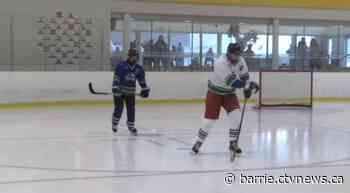 Innisfil Snow Dogs take to the ice to help those with intellectual disabilities play hockey