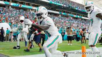 Dolphins' Tyreek Hill uses phone for TD celebration vs. Panthers, WR knows fine's coming, says 'it's worth it'
