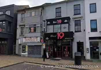 Blackpool: Woman dies and two arrested after bar incident