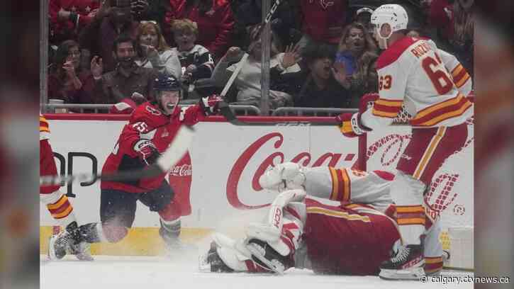 Matthew Phillips scores against old team; Washington Capitals beat Calgary Flames 3-2 in shootout