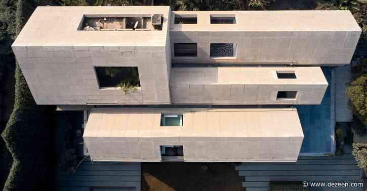 Matra Architects spreads multi-generational Indian home across four concrete blocks