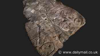 Mysterious engraved rock that lay unstudied for 4,000 years could be a TREASURE MAP for lost monuments in France, scientists say