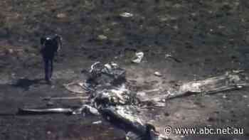 Paddock left charred as police investigate remnants of 'kit-built' plane crash