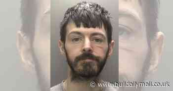 Terrified man was left hanging out of his own car when robber drove off in it