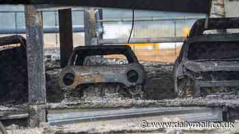 Luton Airport's car park graveyard: Shocking images reveal extent of devastation 10 days after 1,500 vehicles went up in flames as bosses admit it's 'unlikely any will be salvageable'