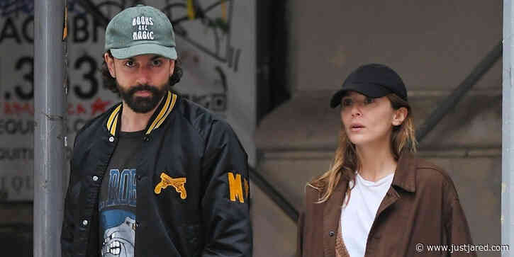 Elizabeth Olsen & Husband Robbie Arnett Go for a Stroll Together in the NYC Rain!