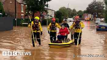 Woman in wheelchair rescued from storm flooding