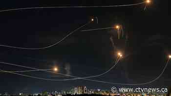 Egypt's border crossing opens to let a trickle of desperately needed aid into besieged Gaza