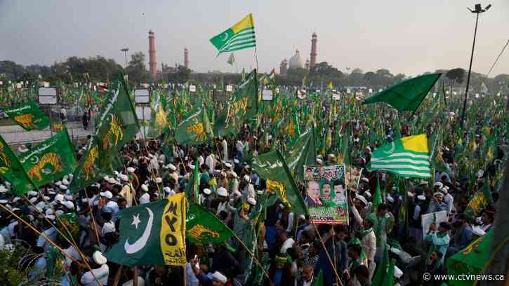 Pakistan's self-exiled former Prime Minister Nawaz Sharif returns home ahead of a parliamentary vote