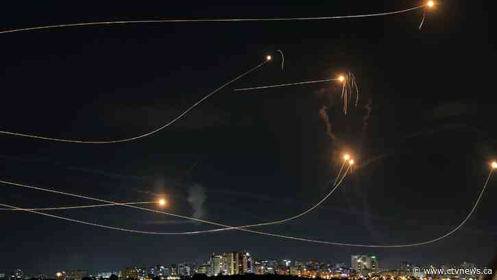 Egypt's border crossing opens to let a trickle of desperately needed aid into besieged Gaza