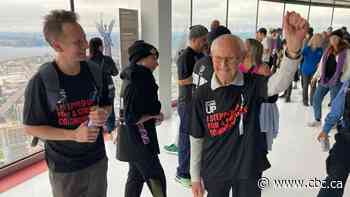 99-year-old man climbs CN Tower for charity