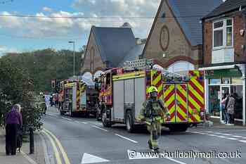 Firefighters at Withernsea Post Office as smoke seen coming through door