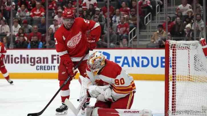 DeBrincat notches hat trick, hot Red Wings flatten Flames 6-2