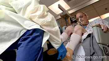 A month after a pig heart transplant, man works to regain strength with no rejection so far