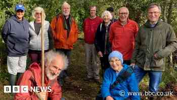 Poole volunteers clear right of way on former rail line