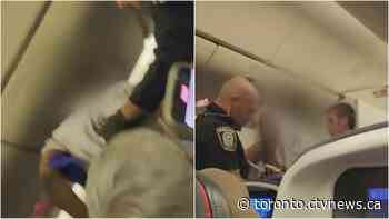 Video shows police removing 'disruptive' passenger from Toronto-bound overseas flight