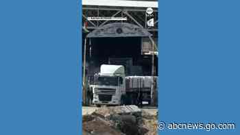 WATCH:  Trucks with humanitarian aid enter through Rafah border crossing