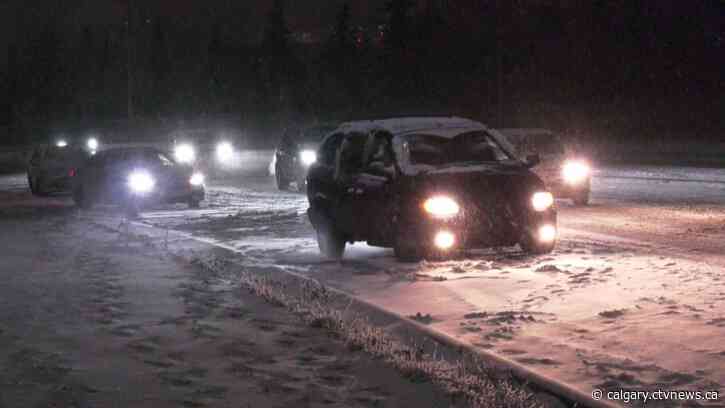 Snow falls over Calgary, southern Alberta; caution advised on roads, highways